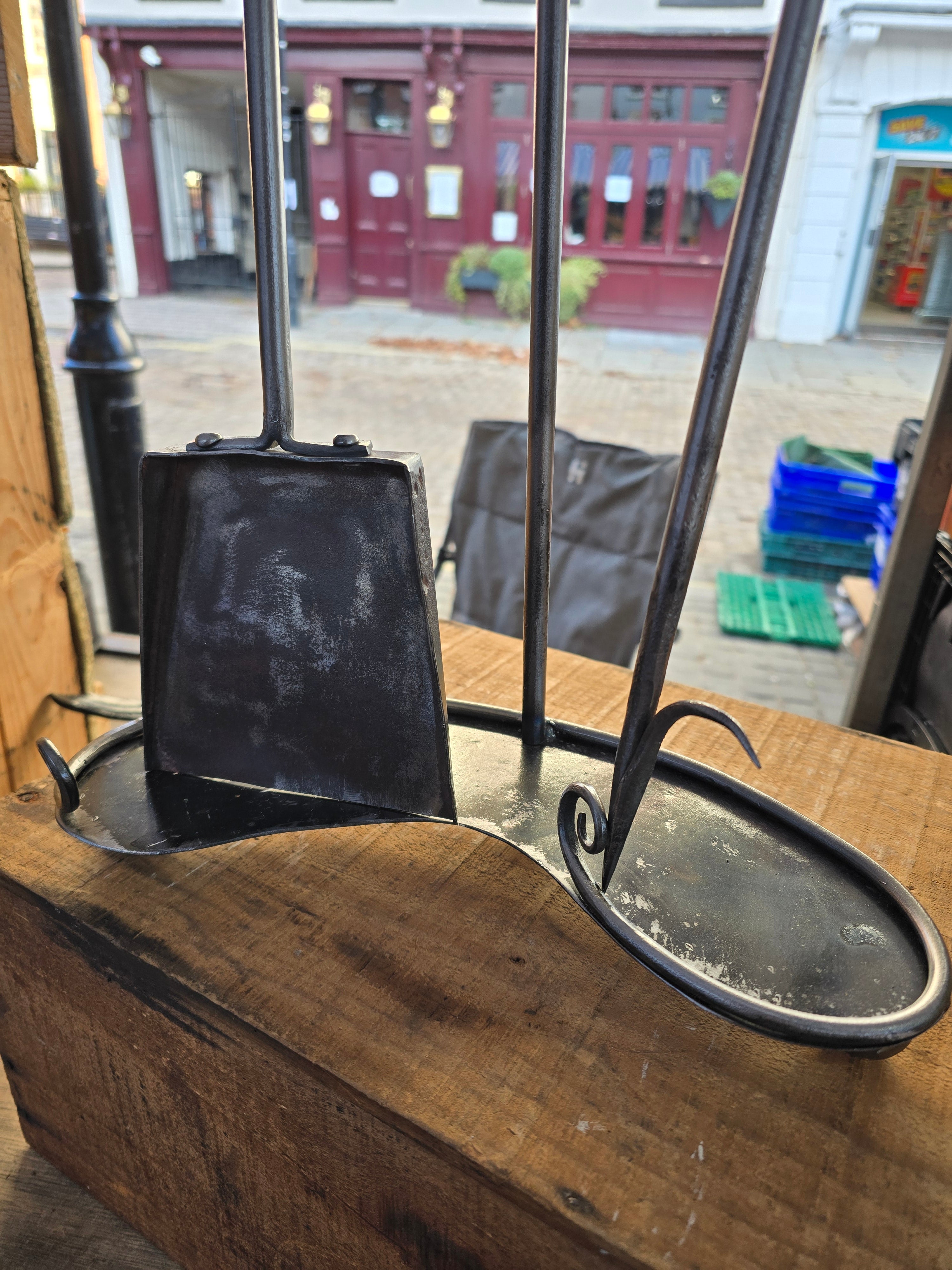 Handforged companion set.